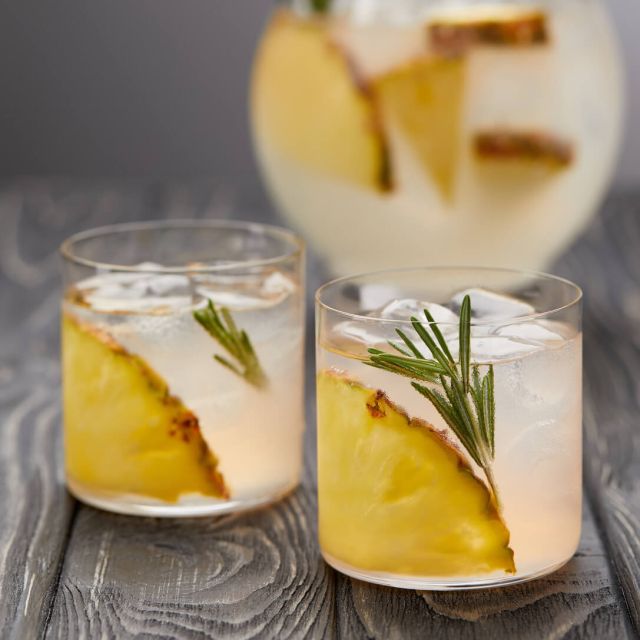 jug-of-lemonade-with-pineapple-and-rosemary-two-g-2024-11-10-22-38-28-utc (1) (1)